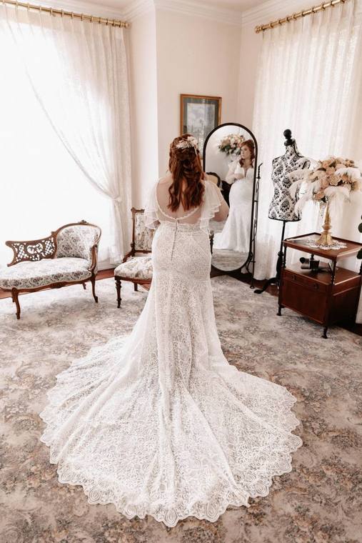Bride in the bride's room preparing before a garden wedding at On Collin's Pond