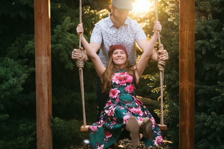 The garden swing in the trees at sunset at On Collin's Pond in Middleton, Idaho