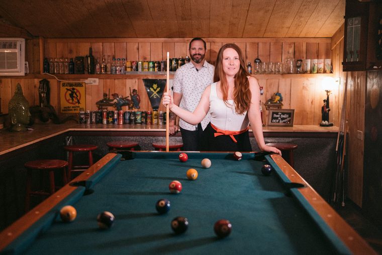 Guests playing pool in the man cave at On Collin's Pond in Middleton, Idaho