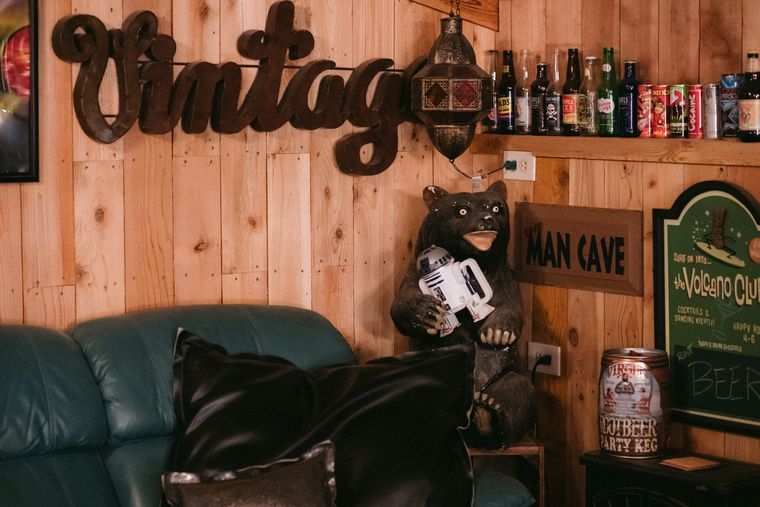 The vintage lounge and seating inside the man cave at On Collin's Pond