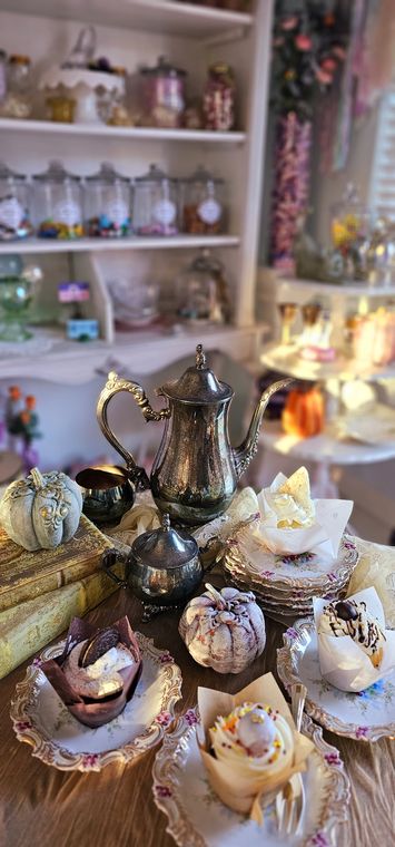 Tea party table set with silver service and pastries at On Collin's Pond in Middleton, Idaho