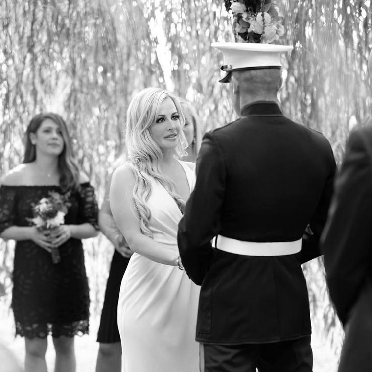 Black and white photo of a ceremony beneath the Grandmother Willow at On Collin's Pond