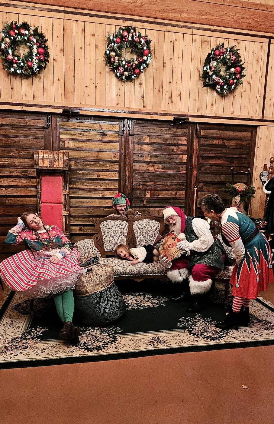 Mrs. Claus and the elves on the lodge set during the Food Pantry Fundraiser