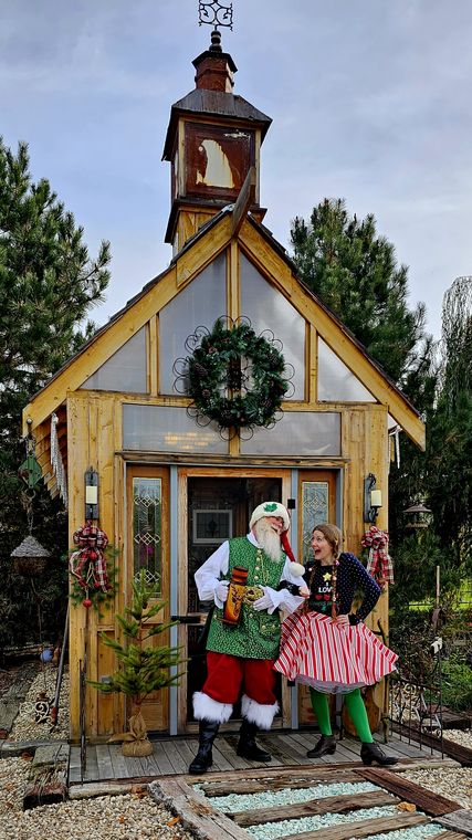 Santa Phil at the garden chapel door in winter at On Collin's Pond