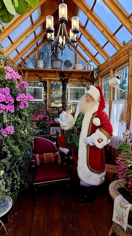 Santa Phil inside the old-world greenhouse at On Collin's Pond