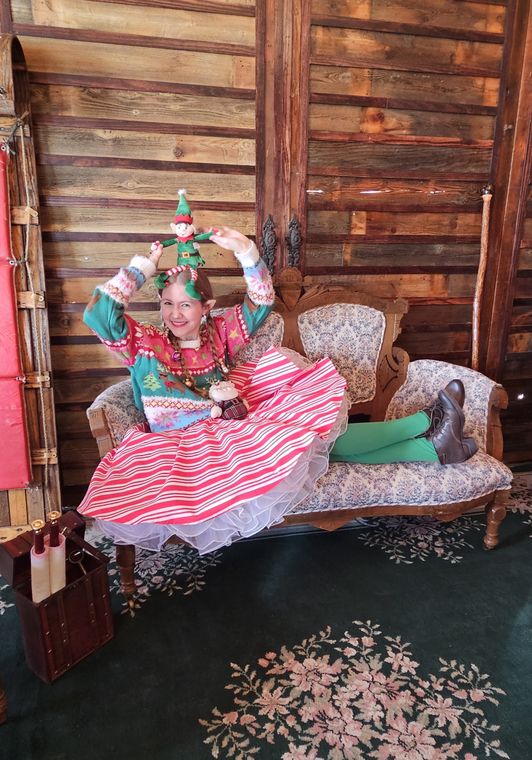 An elf in the lodge at Santa's Workshop on Collin's Pond