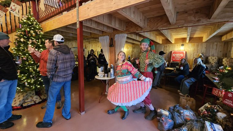 Inside Santa's Lodge and Workshop decorated for Christmas at On Collin's Pond