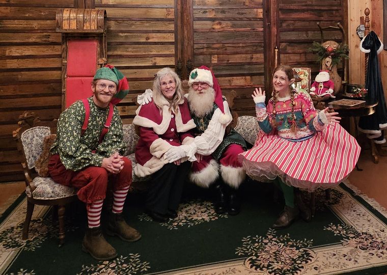 Santa Phil, Mrs. Claus and the elves in the lodge at On Collin's Pond