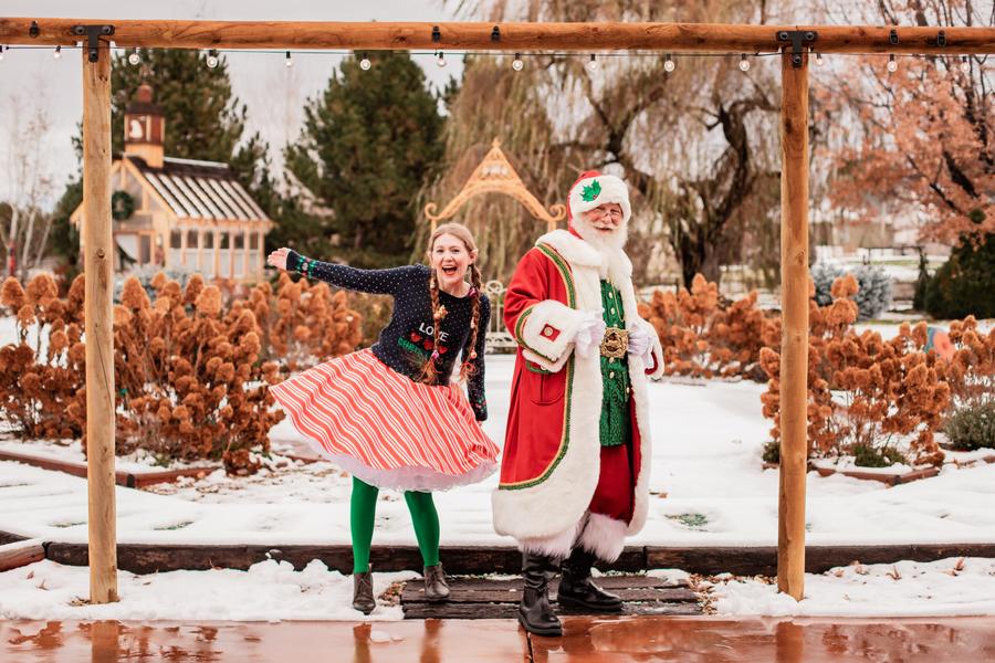 Santa Phil and Mrs. Claus in the snowy gardens at On Collin's Pond in Middleton, Idaho