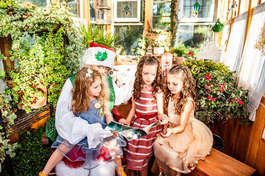 Children visiting Mrs. Claus's greenhouse during Santa's Workshop at On Collin's Pond